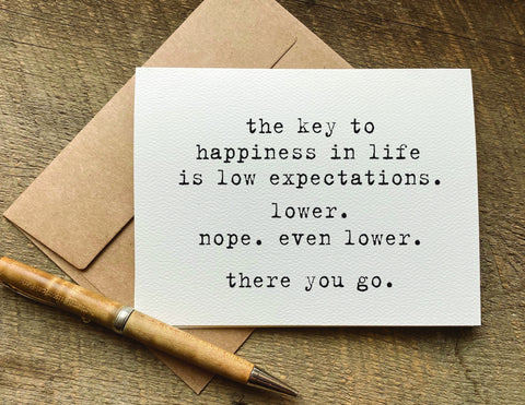 the key to happiness is low expectations / greeting card