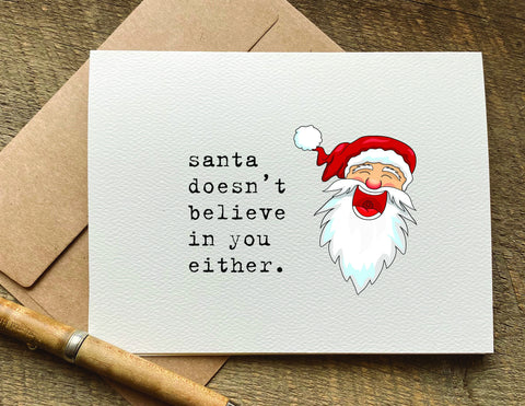santa doesn't believe in you either snarky christmas card