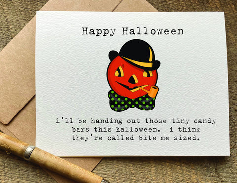 i’ll be handing out those tiny candy bars / halloween card