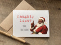 funny christmas card with a black santa that says: naughty list? yeah, that tracks