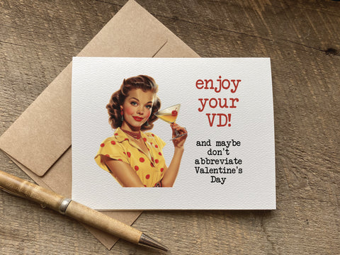 Card with vintage-style illustration of a woman holding a drink, text 'enjoy your VD! and maybe don't abbreviate Valentine's Day', 