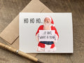 funny christmas card with santa claus holding a sign that says "ho ho holy shit what a year"