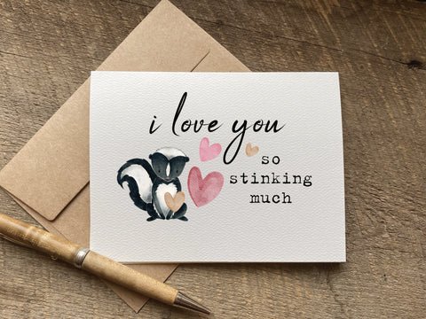 cute valentines day or anniversary card with a skunk and hearts that says: i love you so stinking much