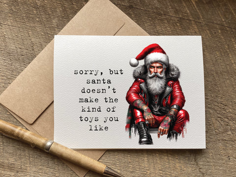 sorry but santa doesn't make the kind of toys you like / christmas card
