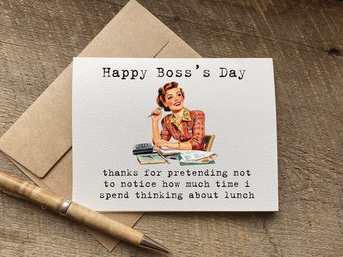  card with black typewriter-style text reading 'Happy Boss's Day thanks for pretending not to notice how much time i spend thinking about lunch" and a vintage illustration of a woman at a desk