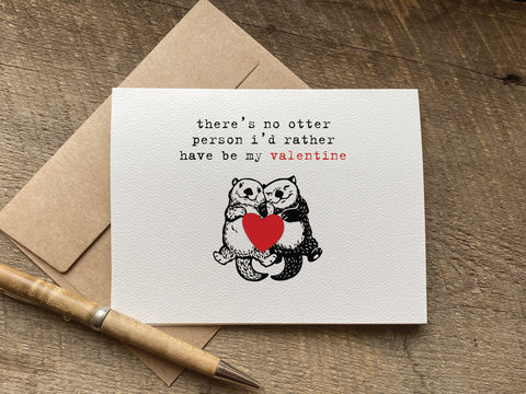 valentines day card with otters holding a heart that says: there's no otter person i'd rather have be my valentine