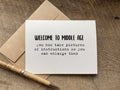 funny birthday card that says: welcome to middle age you now take pictures of instructions so you can enlarge them