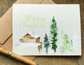 merry christmas pretty scenery christmas card with cabin in the woods